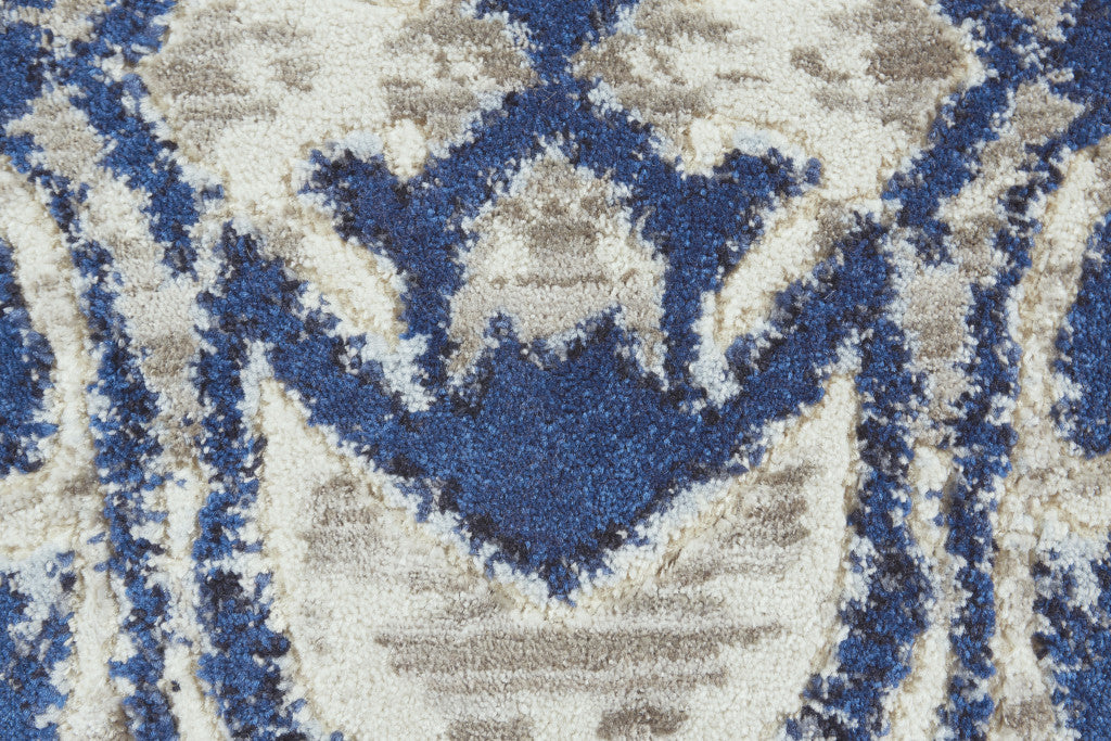 7' X 10' Blue Taupe And Ivory Ikat Distressed Area Rug