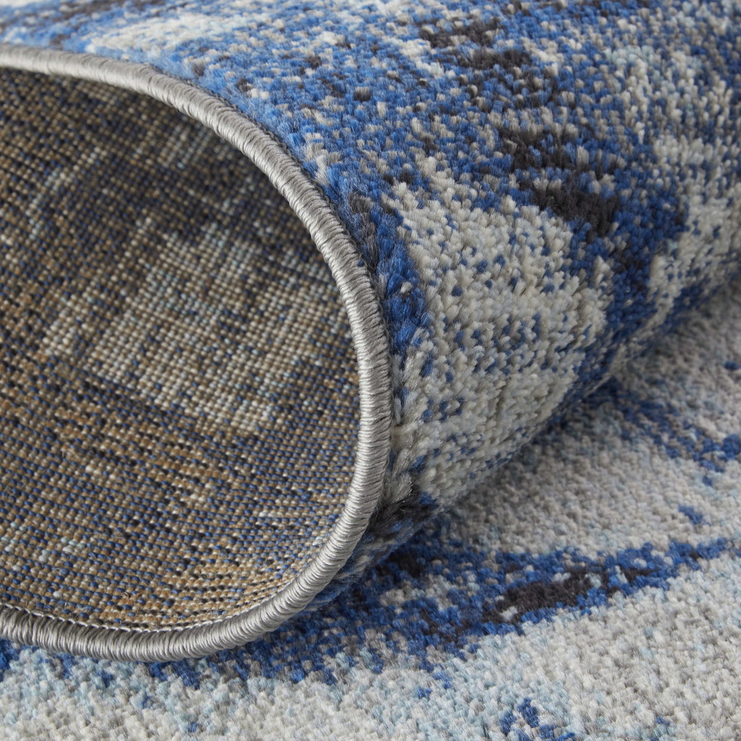 8' Blue and Ivory Abstract Power Loom Distressed Runner Rug