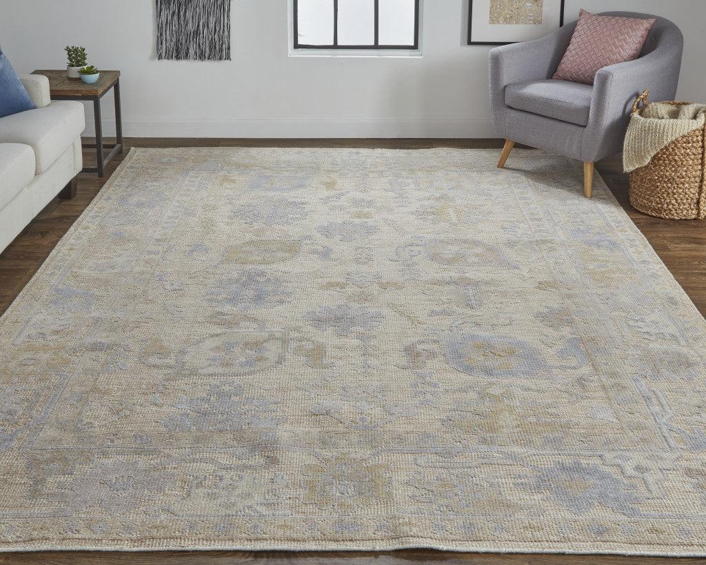 10' X 14' Tan Orange And Blue Floral Hand Knotted Stain Resistant Area Rug