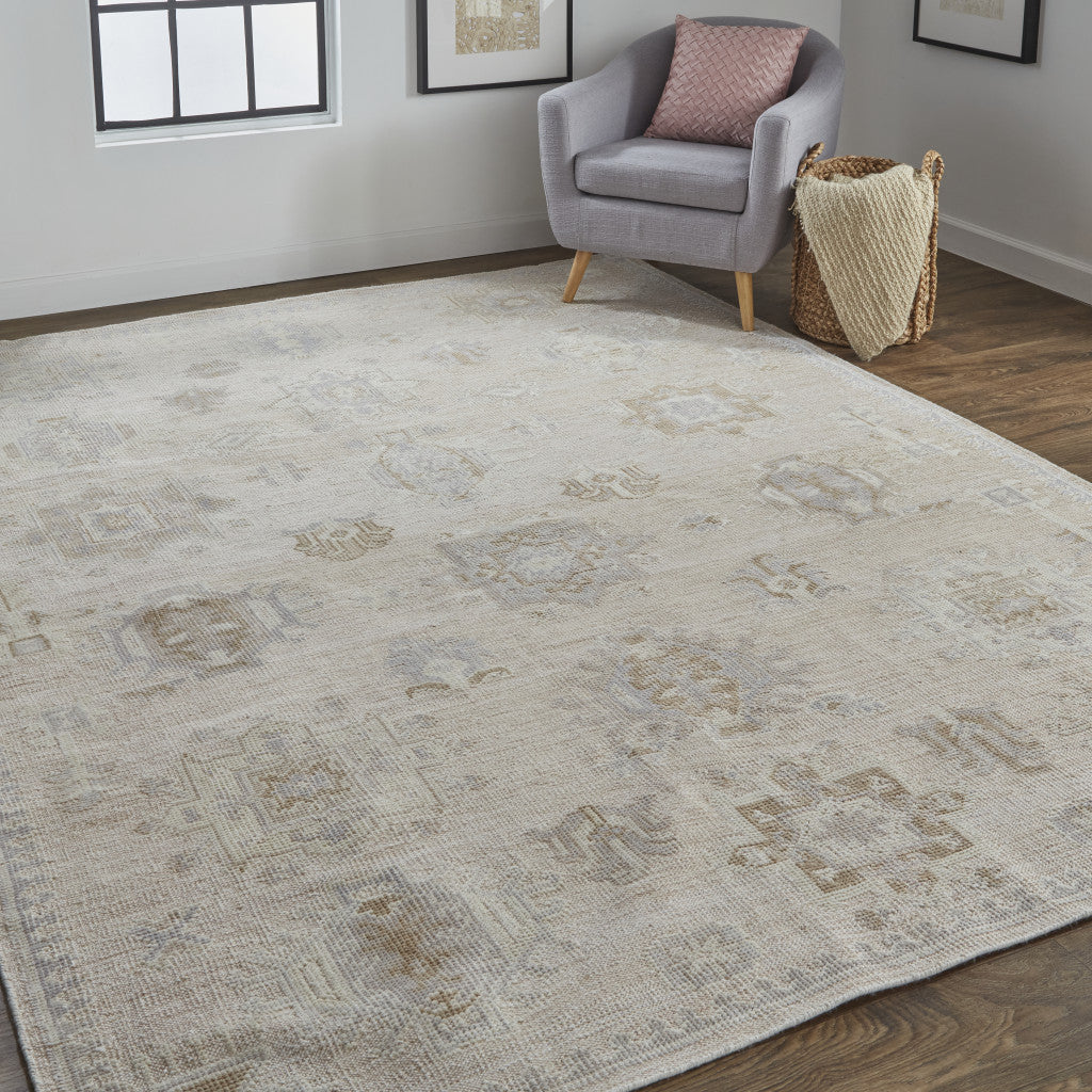 10' X 14' Tan And Brown Floral Hand Knotted Stain Resistant Area Rug