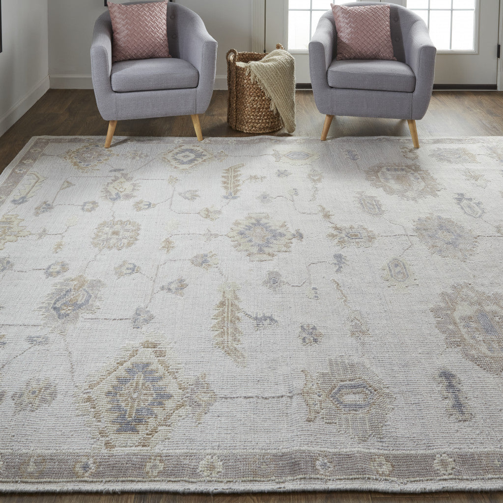 10' X 14' Ivory And Orange Floral Hand Knotted Stain Resistant Area Rug