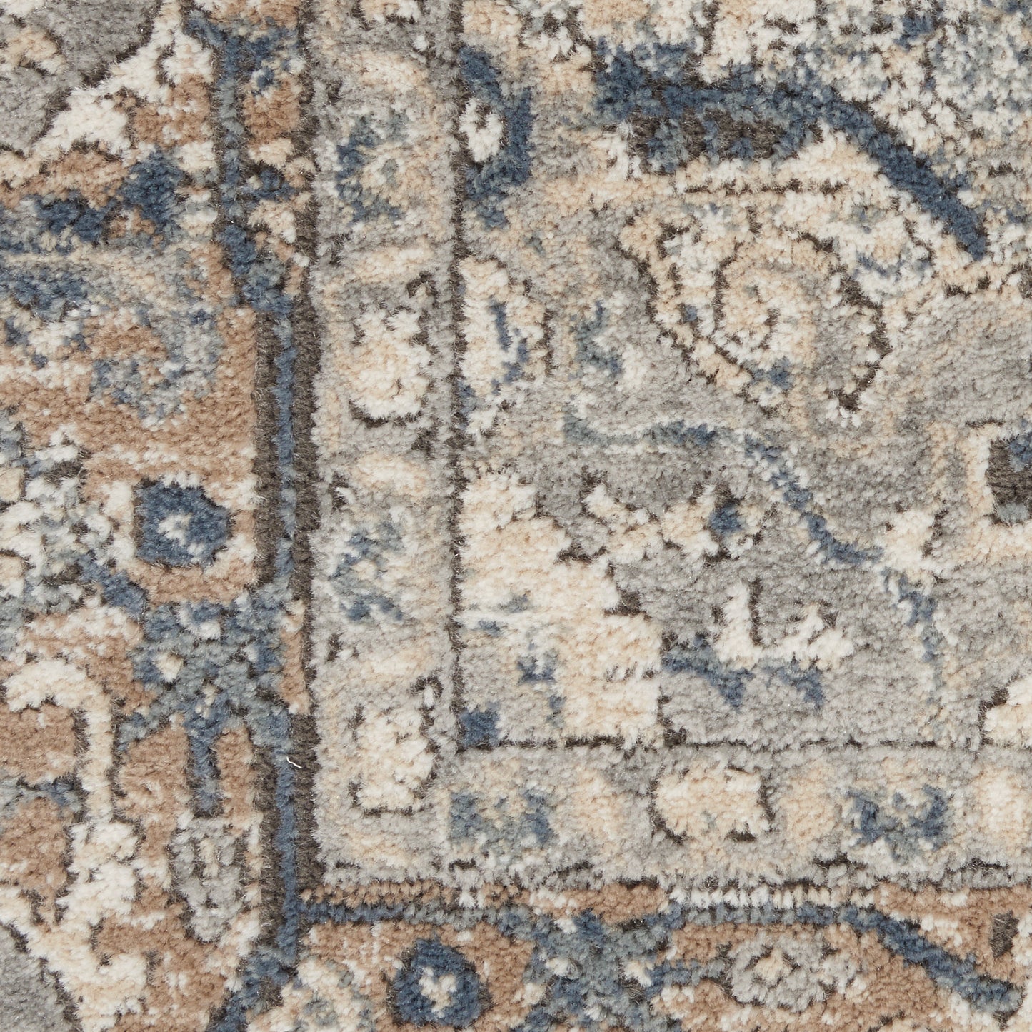 7' x 10' Ivory Floral Power Loom Area Rug