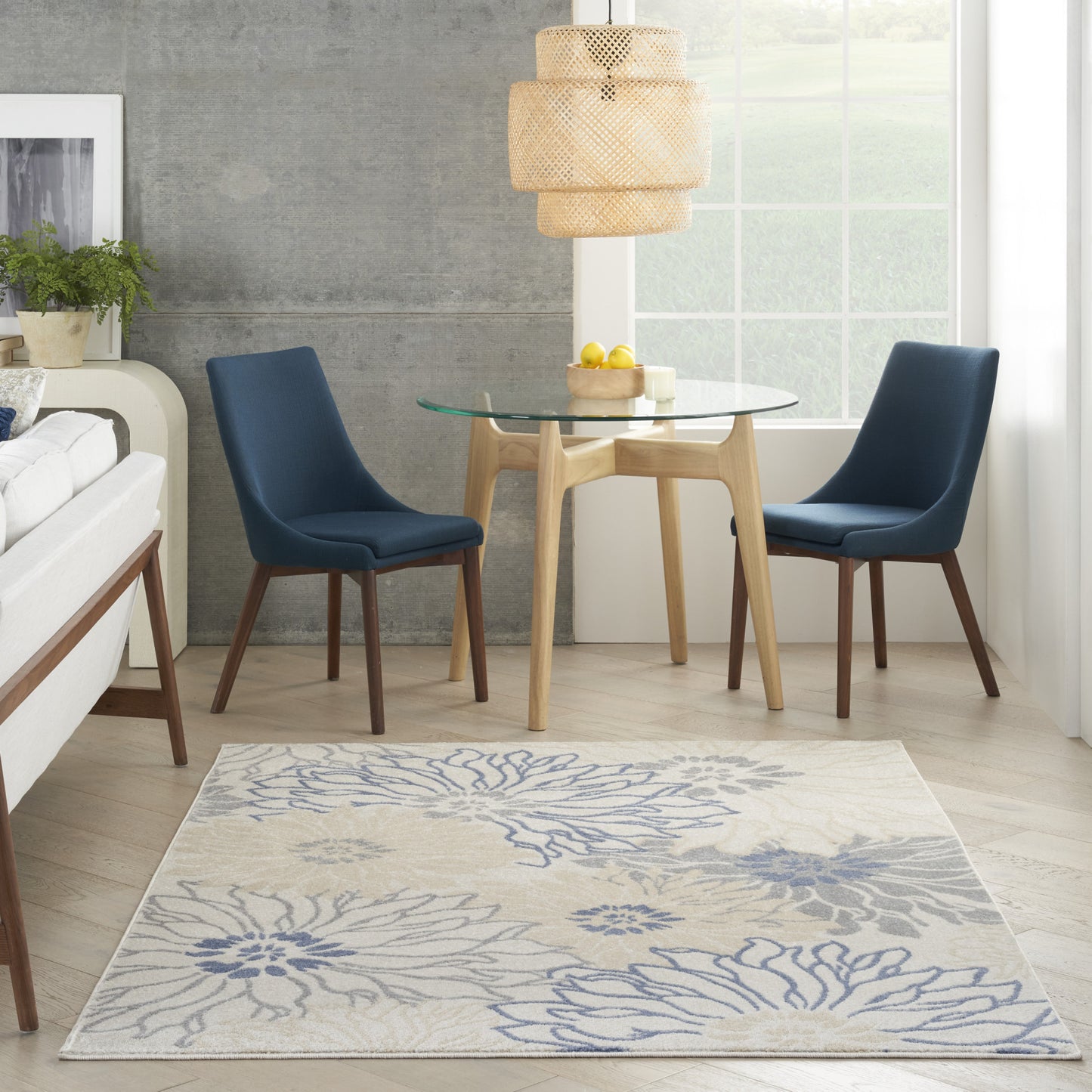 5' x 7' Cream Floral Power Loom Distressed Area Rug