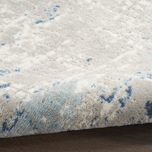 8' x 10' Blue and Gray Abstract Power Loom Area Rug
