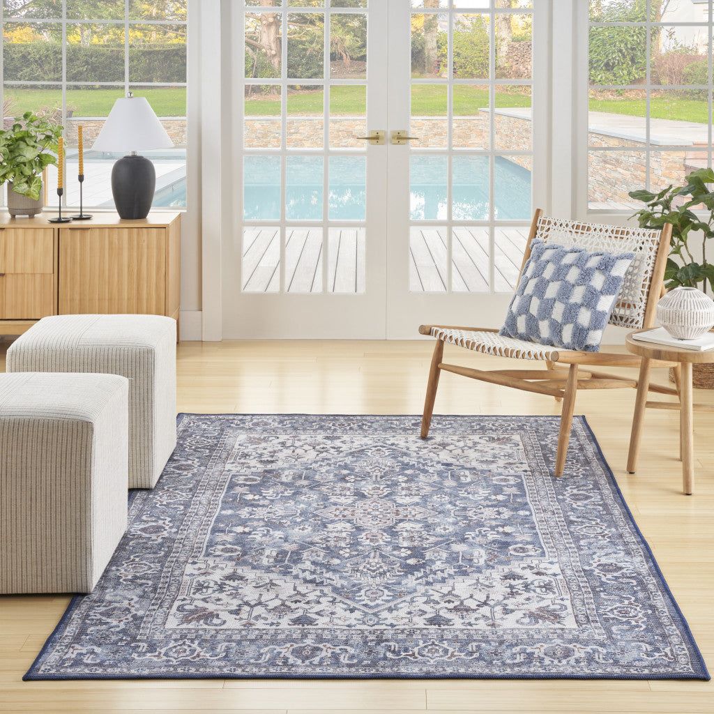 5' x 7' Gray Ivory and Blue Floral Power Loom Distressed Washable Area Rug