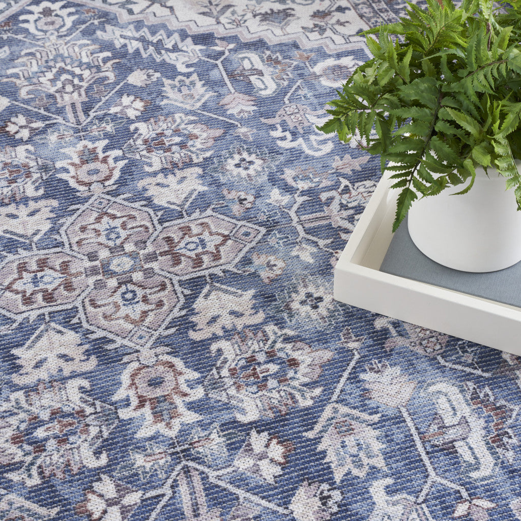 5' x 7' Gray Ivory and Blue Floral Power Loom Distressed Washable Area Rug
