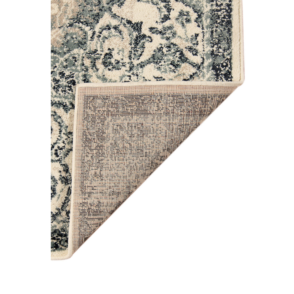 5' x 8' Beige and Blue Medallion Power Loom Area Rug