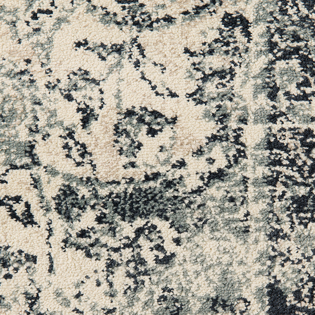 5' x 8' Beige and Blue Medallion Power Loom Area Rug