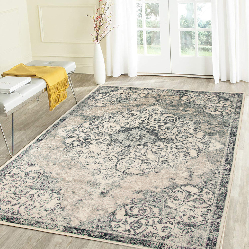 5' x 8' Beige and Blue Medallion Power Loom Area Rug