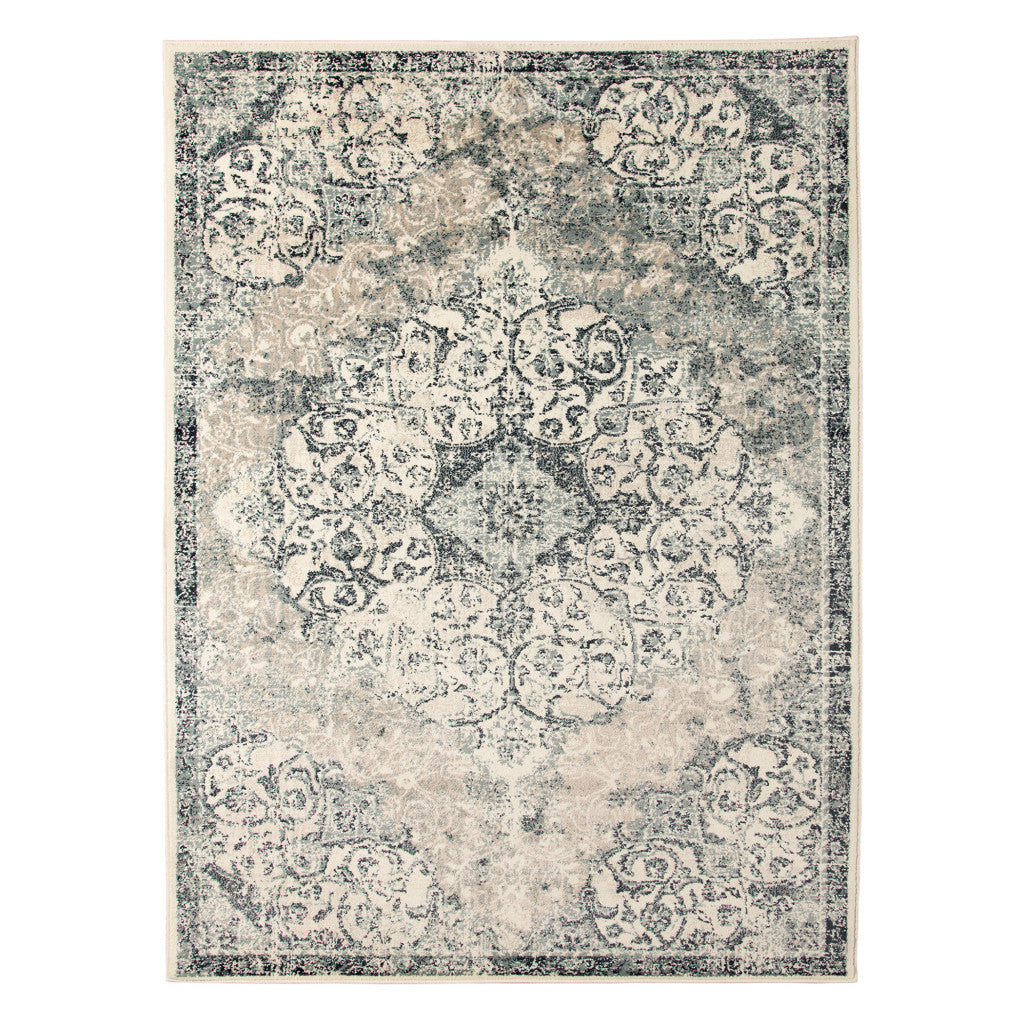 5' x 8' Beige and Blue Medallion Power Loom Area Rug