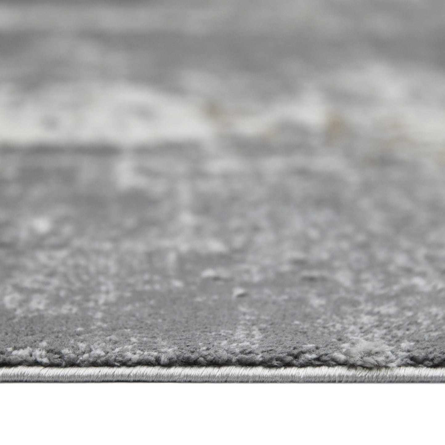 5' x 8' Gray and Ivory Abstract Power Loom Area Rug