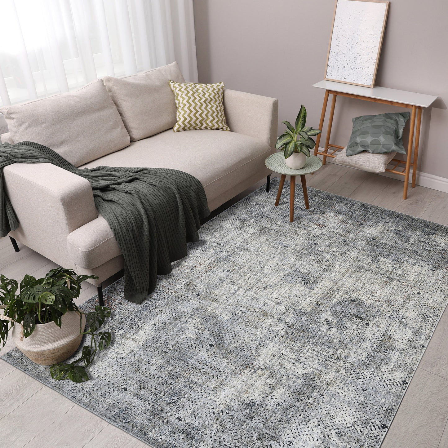 5' x 8' Gray and Ivory Abstract Power Loom Area Rug