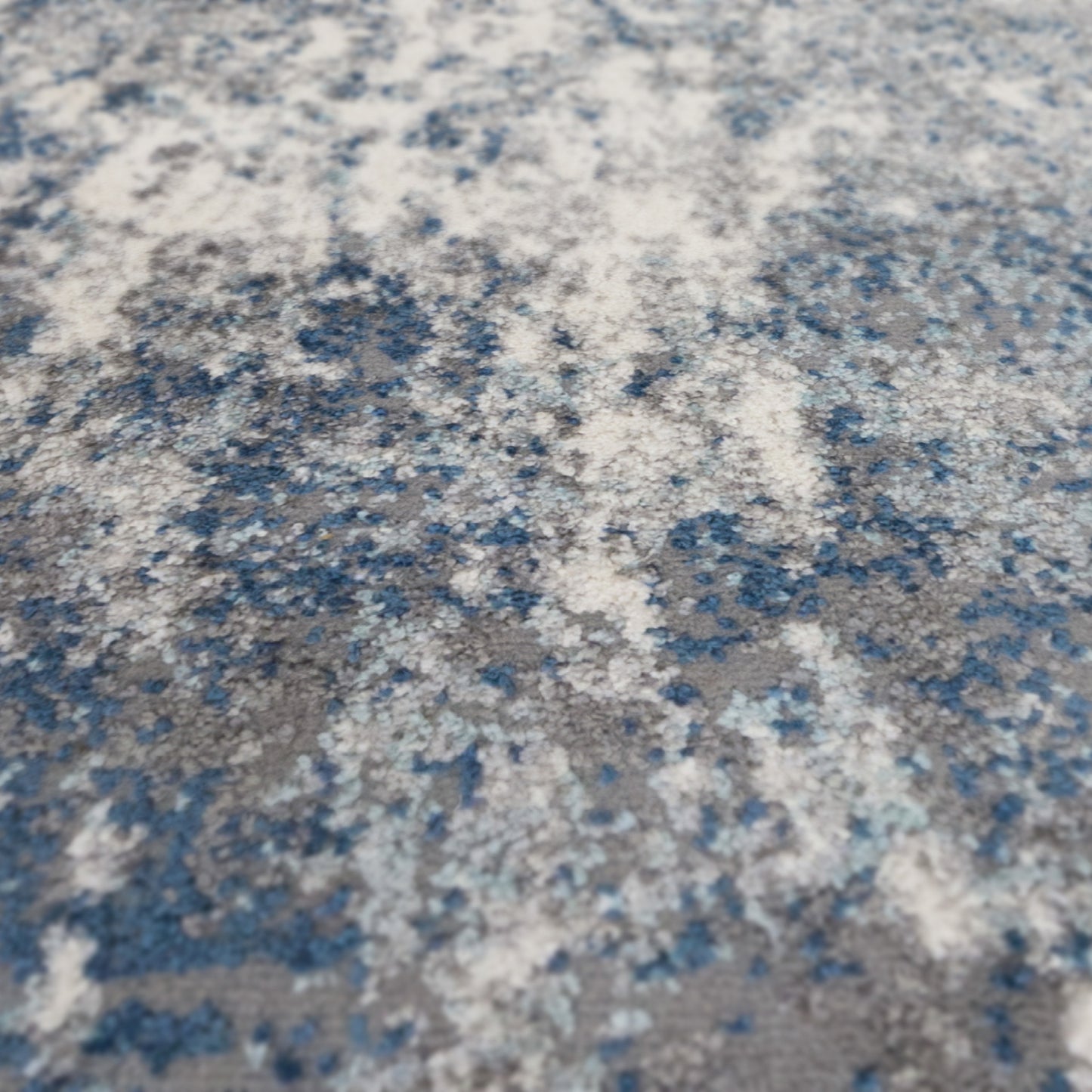 5' x 8' Blue and Gray Abstract Power Loom Area Rug