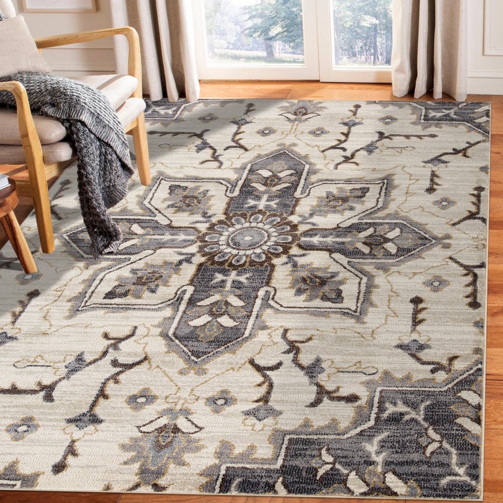 5' x 7' Ivory and Blue Medallion Power Loom Area Rug