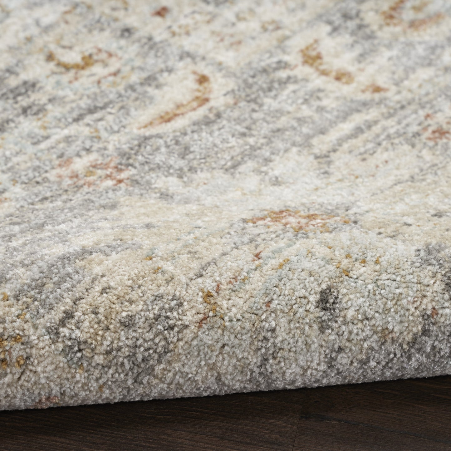 5' x 8' Beige Ivory and Gray Oriental Power Loom Distressed Area Rug With Fringe