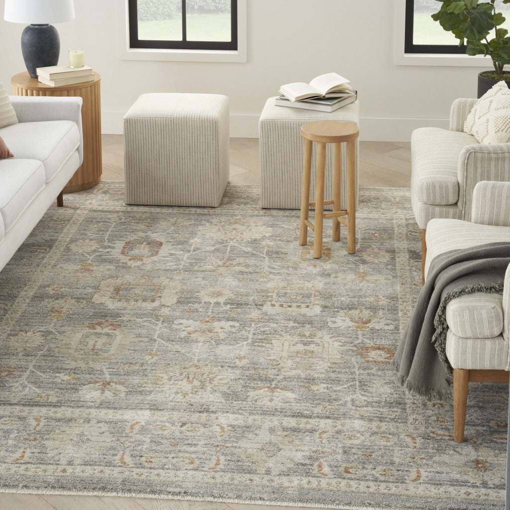 5' x 8' Beige Ivory and Gray Oriental Power Loom Distressed Area Rug With Fringe