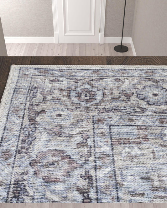 10' Beige and Ivory Floral Power Loom Distressed Washable Runner Rug