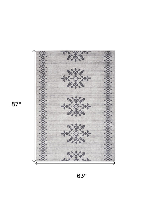 5' x 7' Gray and Ivory Geometric Power Loom Washable Area Rug