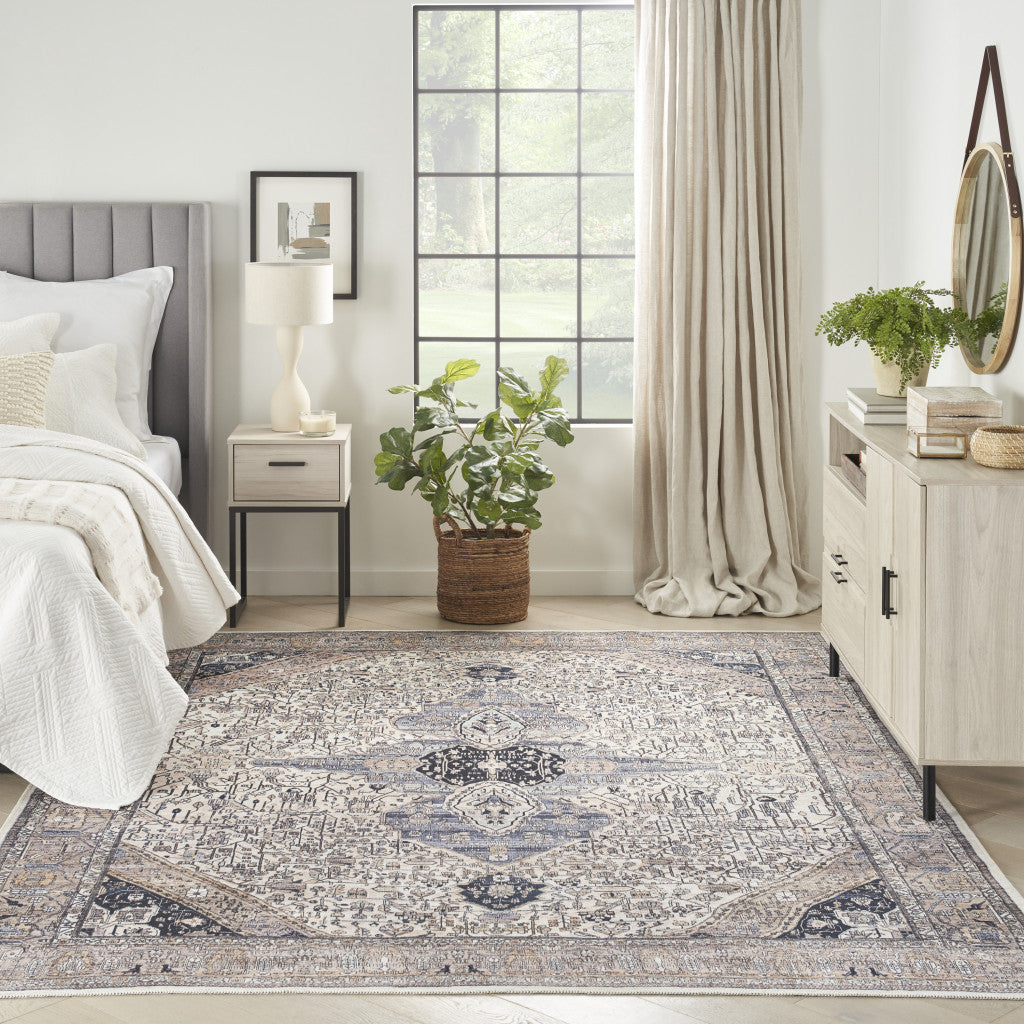 5' x 7' Ivory and Blue Oriental Power Loom Distressed Washable Non Skid Area Rug