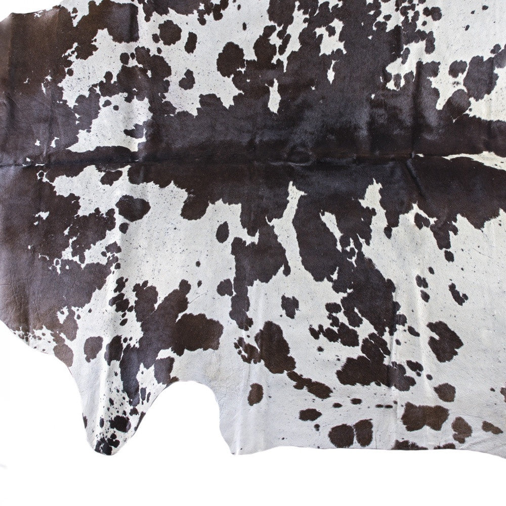 5' x 7' Brown and White Cowhide Hand Knotted Area Rug