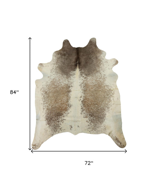 6' x 7' Brown and White Cowhide Hand Knotted Area Rug