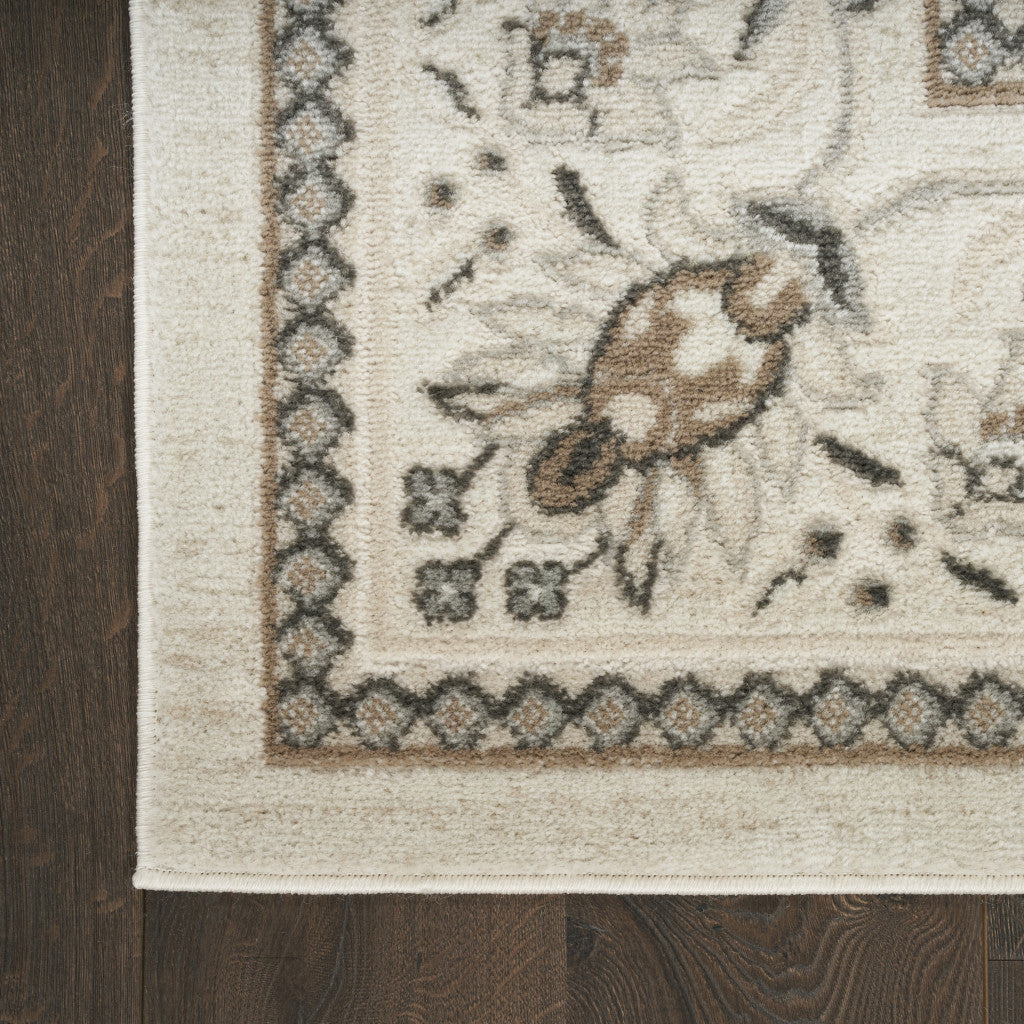 5' x 7' Cream Floral Distressed Area Rug