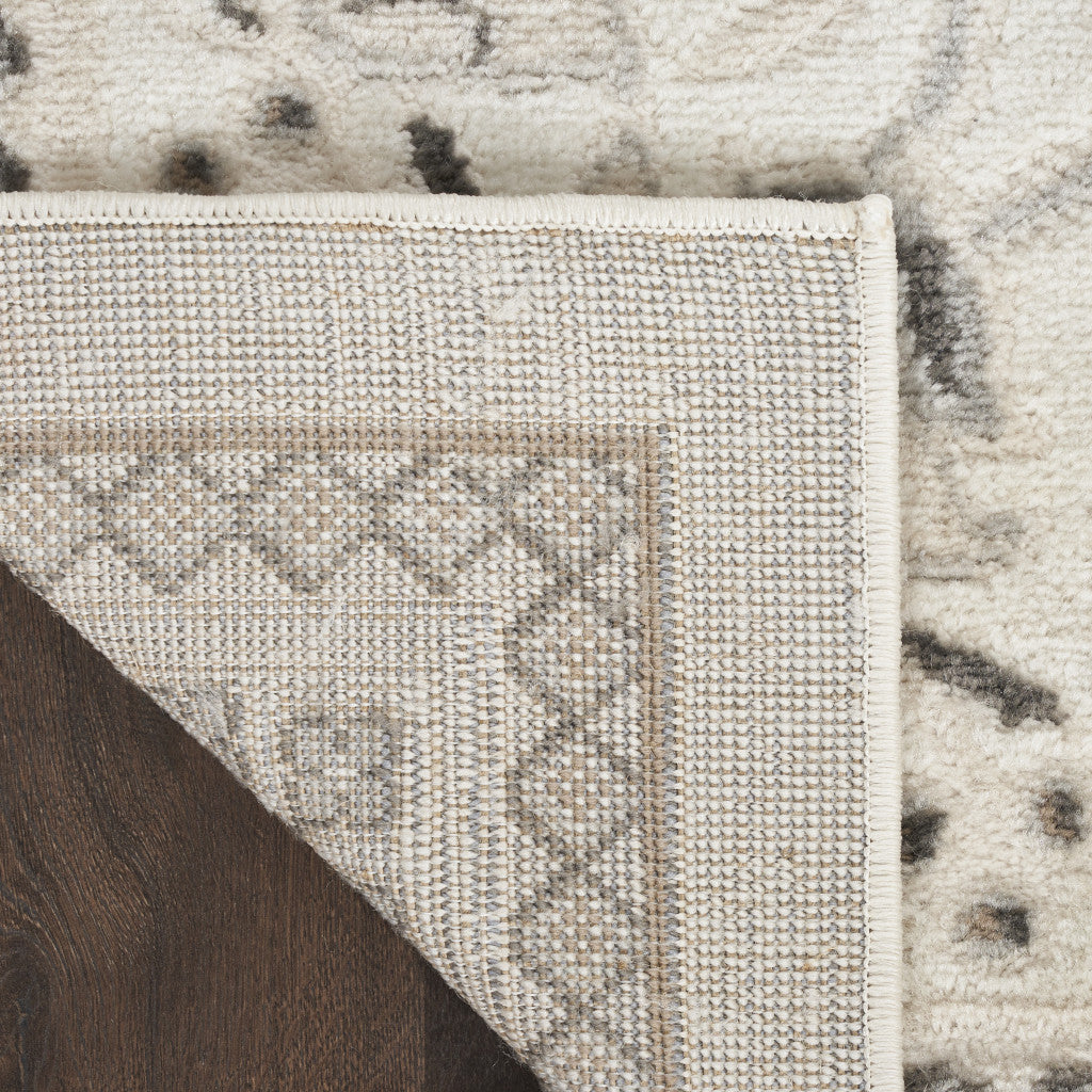 5' x 7' Cream Floral Distressed Area Rug