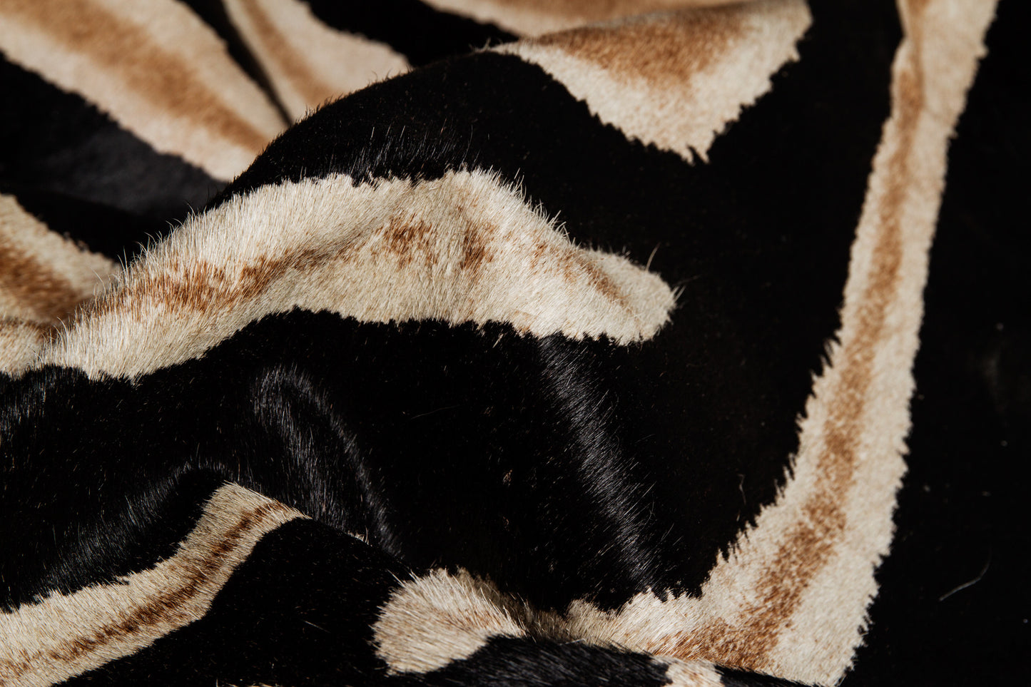 5' x 7' Brown and Black Cowhide Hand Knotted Area Rug