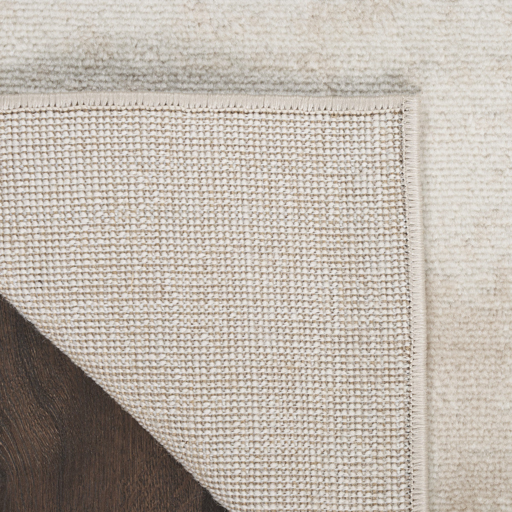 5' x 7' Cream Abstract Area Rug