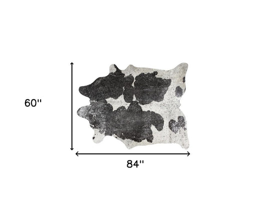 5' x 7' Black and White Cowhide Hand Knotted Area Rug