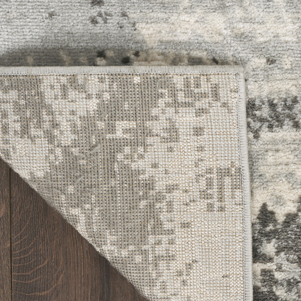 5' x 7' Cream Abstract Area Rug