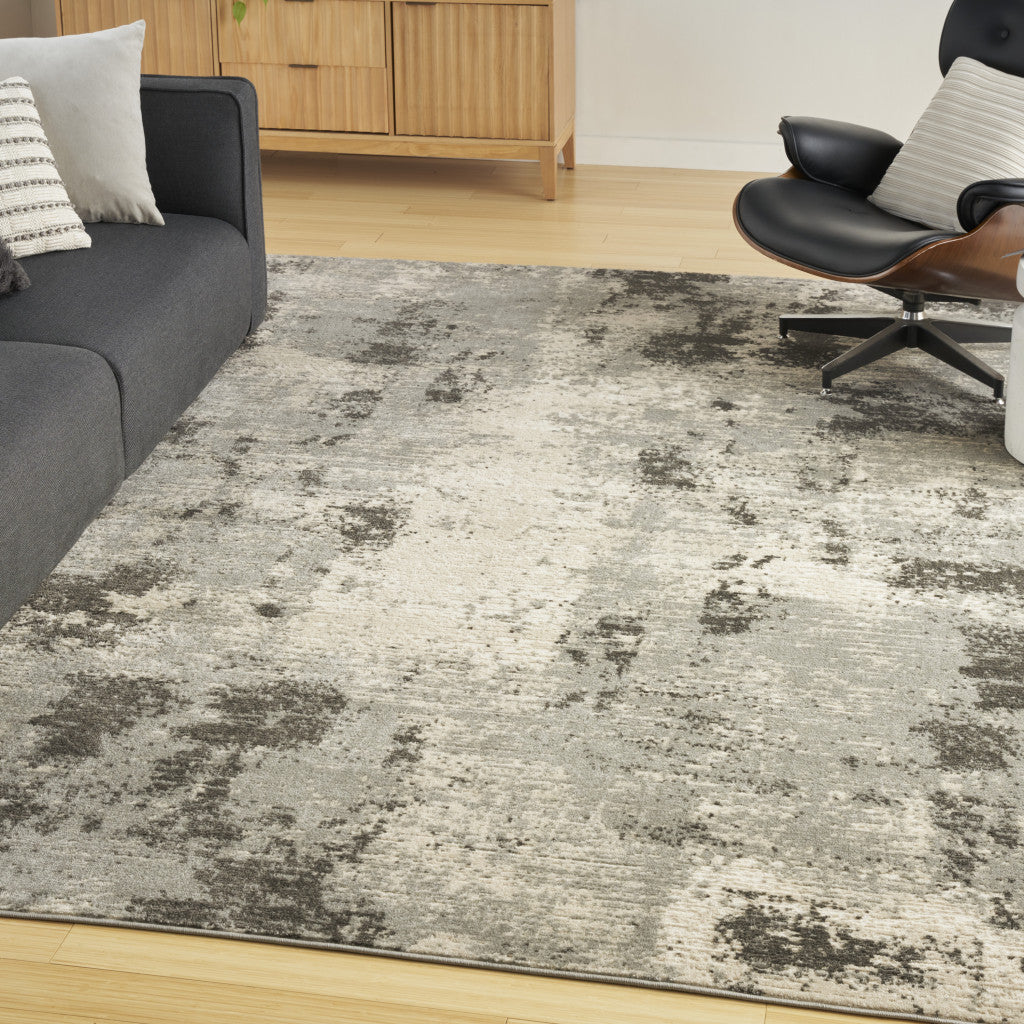 5' x 7' Cream Abstract Area Rug