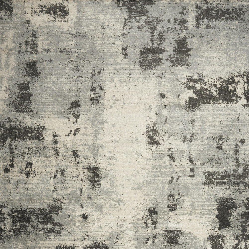 5' x 7' Cream Abstract Area Rug