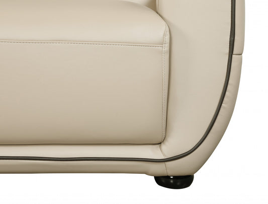 86" Beige And Brown Leather Sofa