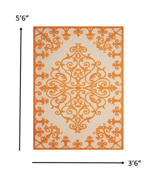 4' X 6' Orange And Ivory Damask Indoor Outdoor Area Rug