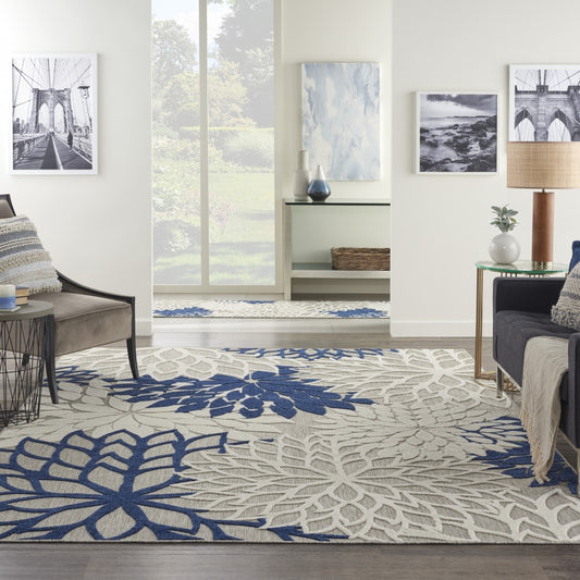 8' X 11' Ivory And Blue Floral Indoor Outdoor Area Rug