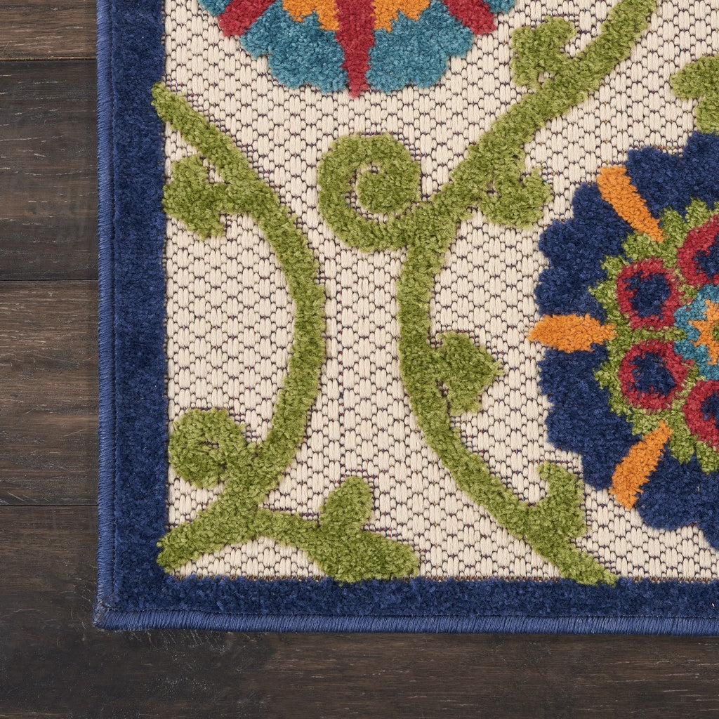 7' X 10' Ivory And Blue Floral Indoor Outdoor Area Rug