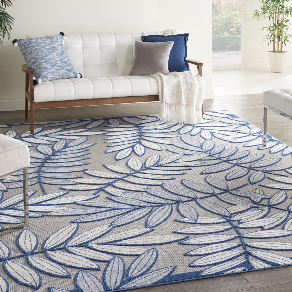 8' X 11' Ivory And Blue Floral Indoor Outdoor Area Rug