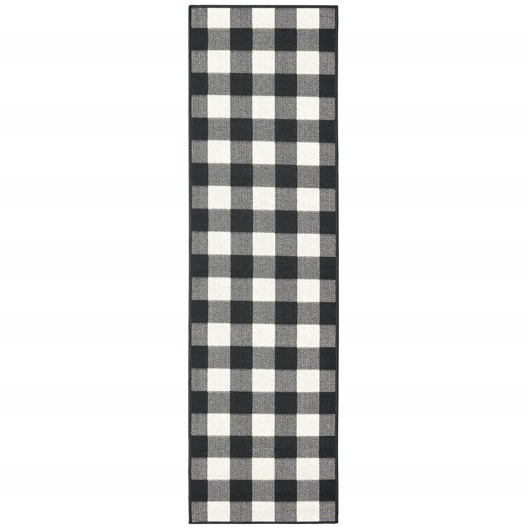 2' X 8' Black and Ivory Indoor Outdoor Area Rug