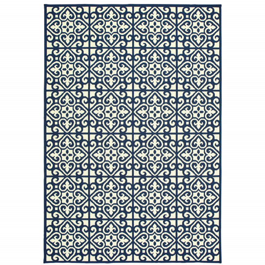 2' X 4' Ivory and Blue Geometric Stain Resistant Indoor Outdoor Area Rug