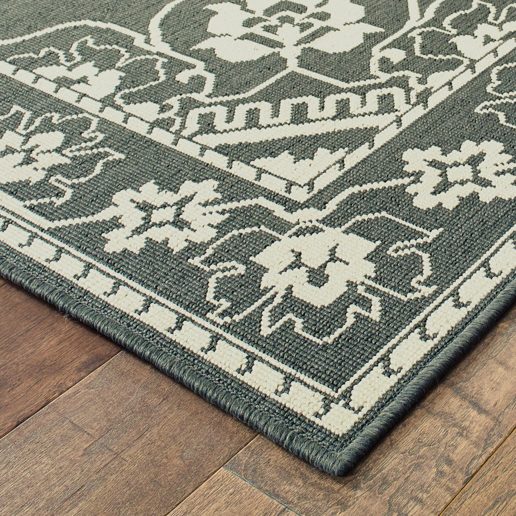 5' x 8' Gray and Ivory Oriental Stain Resistant Indoor Outdoor Area Rug