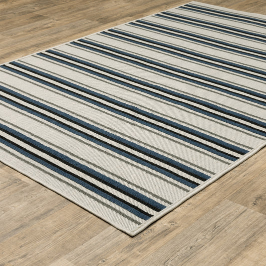 7' x 9' Blue and Beige Geometric Stain Resistant Indoor Outdoor Area Rug
