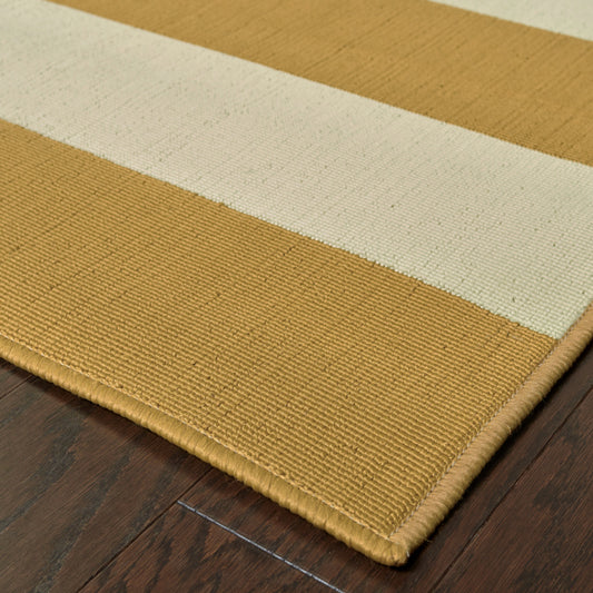 5' x 8' Gold and Ivory Geometric Stain Resistant Indoor Outdoor Area Rug