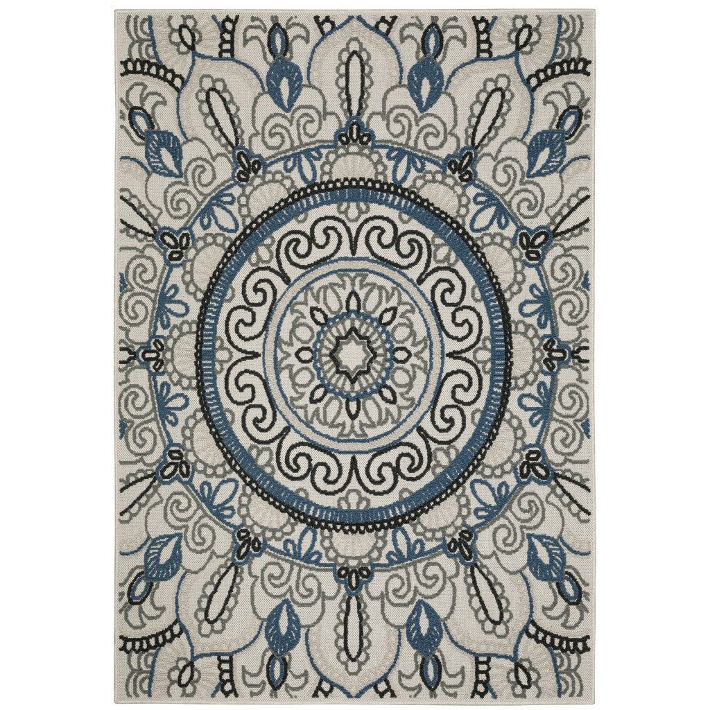 7' x 9' Blue and Beige Geometric Stain Resistant Indoor Outdoor Area Rug