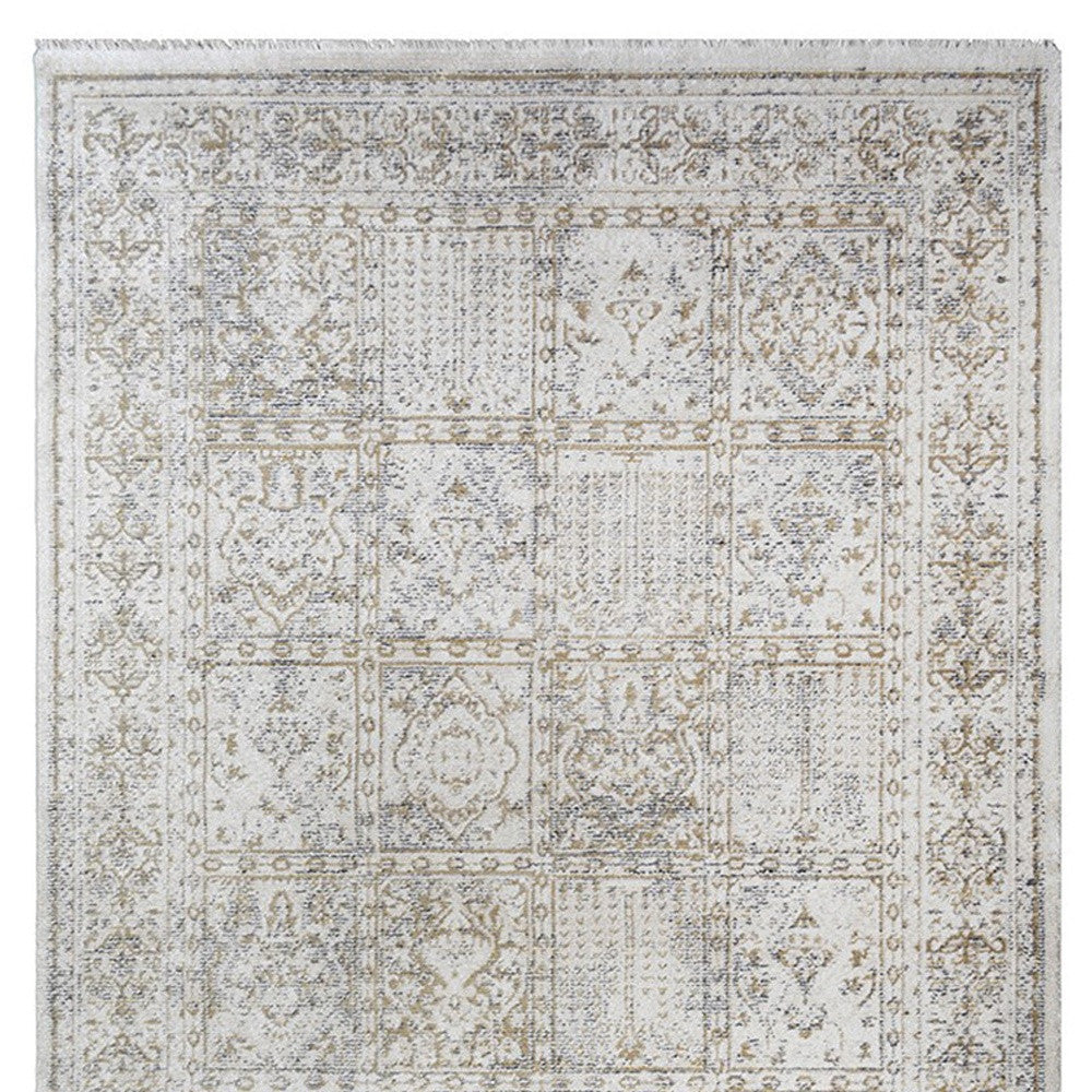 5' x 8' Ivory Oriental Distressed Area Rug With Fringe