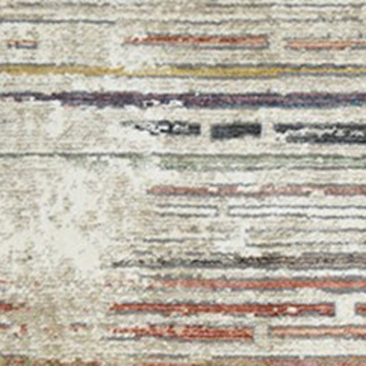 2' x 3' Beige Geometric Distressed Area Rug With Fringe
