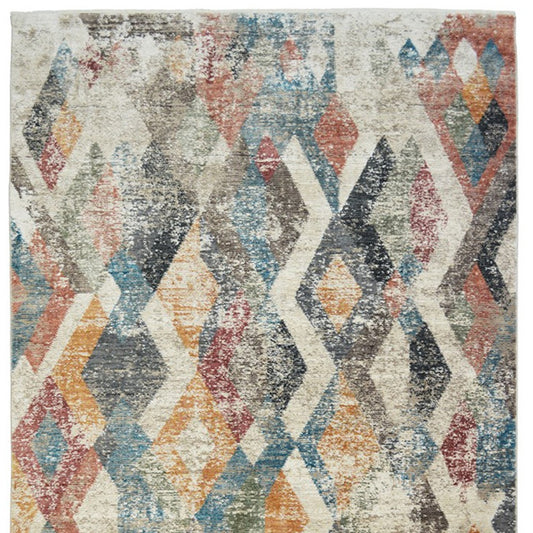 9' X 13' Beige Blue and Gray Geometric Distressed Area Rug With Fringe