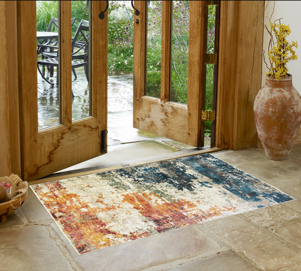 2' x 3' Beige Blue and Ivory Abstract Distressed Area Rug With Fringe