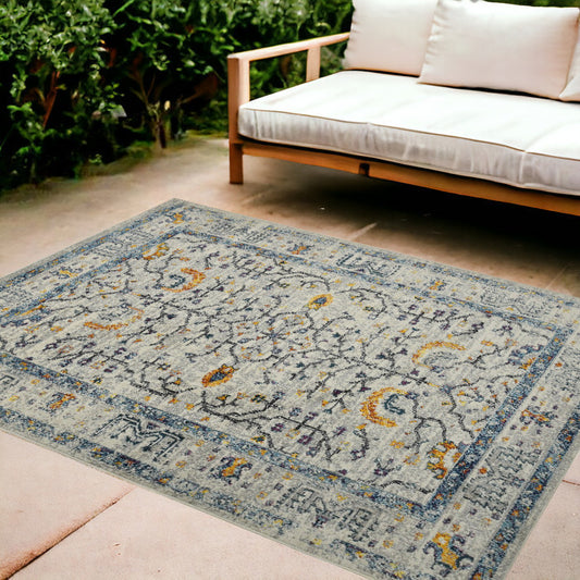 9' x 12' Yellow and Ivory Southwestern Stain Resistant Indoor Outdoor Area Rug