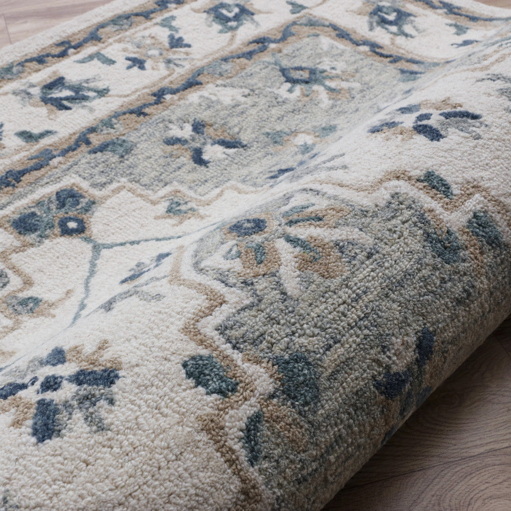 5' x 8' Blue and Ivory Wool Floral Hand Tufted Area Rug